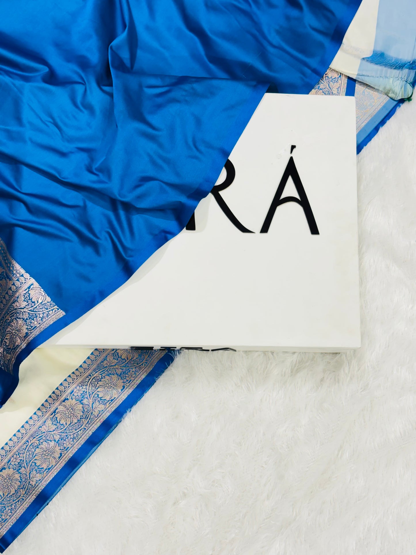 Sitara Off-White Banarasi Mushroom Silk Saree | Light Blue Contrast Border